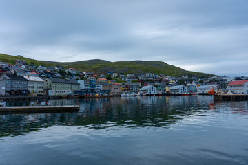 Fototapeta na wymiar Honningsvag, Norway, 13 August 2022 : The harbor of Honningsvag, considered the northernmost town in the world, a few kilometers down North Cape