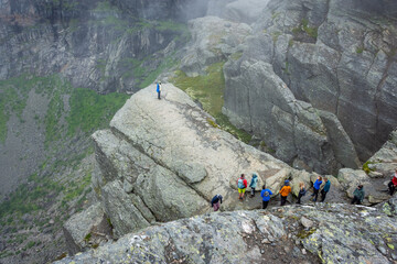Odda, Norway, 8 August 2022:  Long queue to get a photo over Trolltunga, the famous tourist spot