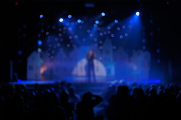Texture blur and defocus, background for design. Stage light at a concert show. Singers, musicians...