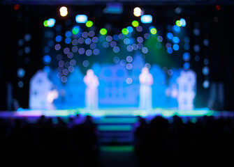 Texture blur and defocus, background for design. Stage light at a concert show in theater.