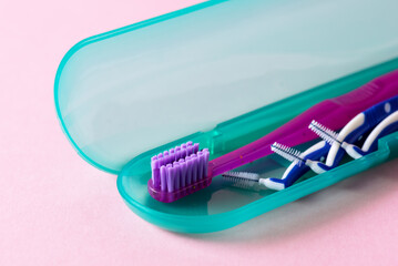 Set for Thorough Cleaning of the Oral Cavity Equipment for Cleaning Braces and Plaque from Teeth Necessary tools for brushing teeth Pink Background