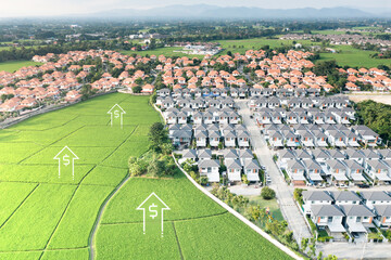 Fototapeta na wymiar Land value in aerial view consist of landscape of green field or agriculture farm, residential or house building in village, up arrow of rate market price. Real estate or property for sale, investment