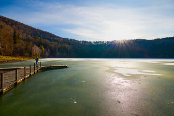 Beautiful landscape with St. Ana Lake in Romania, volcanic lake in December.