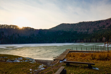 Beautiful landscape with St. Ana Lake in Romania, volcanic lake in December.
