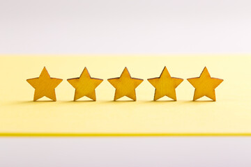 Five Stars Business Concept with Yellow Background