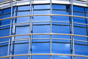 windows and metal structure on the wall of modern buildings of business centers. Background for design, texture modern