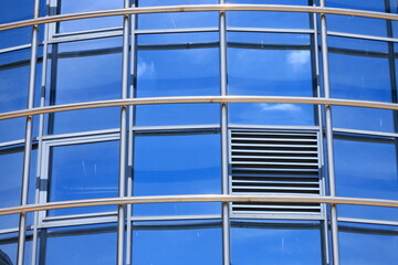 windows and metal structure on the wall of modern buildings of business centers. Background for design, texture modern