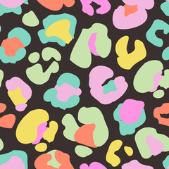 Fototapeta na wymiar Animal skin print in rainbow colors, 90s style. Colorful leopard spot seamless pattern design.