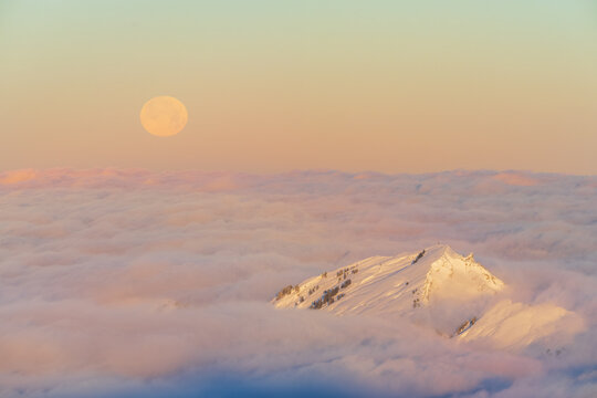 Sunrise with full moon H&auml;hlekopf in the Valley Kleinwalsertal in the Allg&auml;u Alps austria