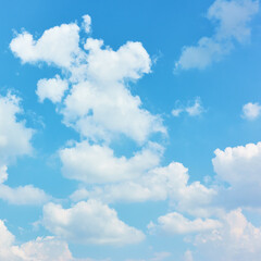 Obraz na płótnie Canvas White heap clouds in the blue sky