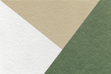Texture of craft white, green and beige shade color paper background, macro. Vintage abstract olive cardboard