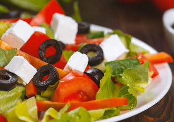 Traditional Greek salad with feta, olives and vegetables