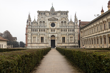 Fototapeta premium PAVIA, ITALY, DECEMBER 28, 2022 - View of Certosa of Pavia, Monastery of Santa Maria delle Grazie, the historical monumental complex including a monastery and a sanctuary, near Pavia, Lombardy, Italy