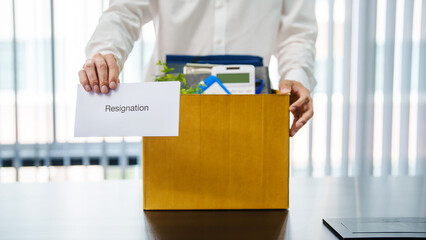 Business people breaking the contract with resignation letter staff reduction resigning leaving the office employee Resignation.