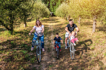 Family On Cycle Ride In Countryside