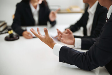 Lawyer discuss the contract and legal document agreement in office. Law and legal concept