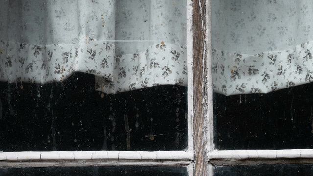 Dirty Weather-Beaten Window Pane