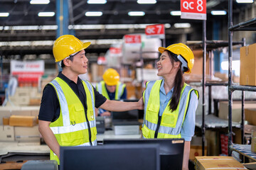 Trainee worker in large depot storage warehouse appreciated thank you to trainer at cashier counter