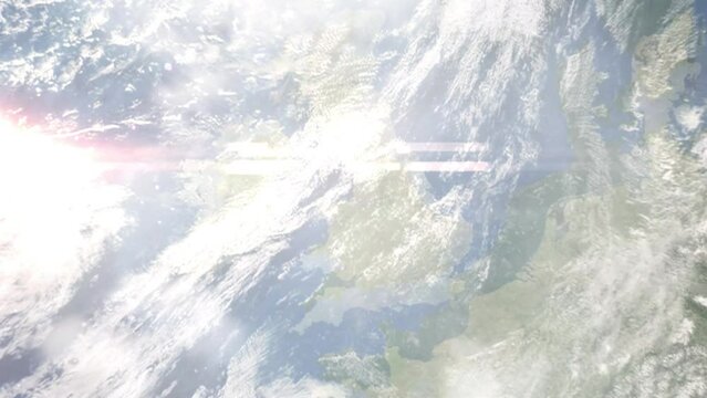Earth zoom in from outer space to city. Zooming on Birkenhead, UK. The animation continues by zoom out through clouds and atmosphere into space. Images from NASA