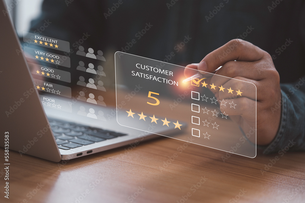 Poster Businessman using laptop computer for select five stars for client evaluation and customer satisfaction after use product and service concept.