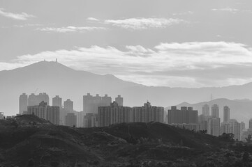 silhouette city skyline and mountain. landscape of Hong Kong at dawn