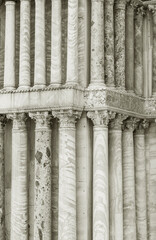 Classical marble column as part of the architecture and a symbol of support in Venice, Italy