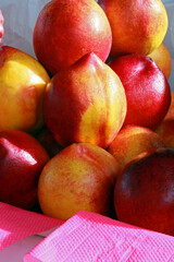 Closeup of ripe nectarines stack on Municipal market of Sao Paulo, Brazil