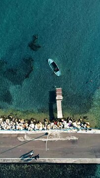 Bird's eye view of the boat in the sea with drone in izmir urla