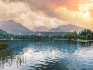 High Tatras mountains national park and Strbske pleso (Strbske lake) beautiful mountain lake during summer sunset