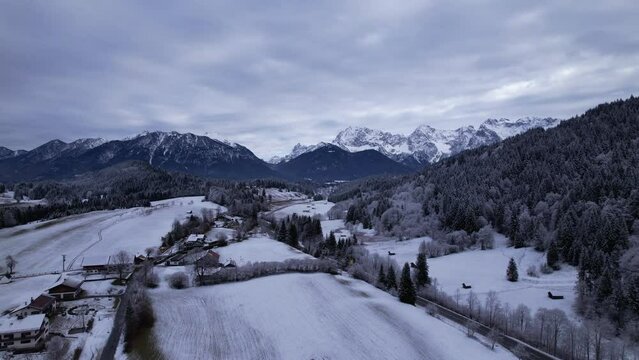 DRONE AERIAL FOOTAGE: The Karwendel mountains, the largest mountain range of the Northern Limestone Alps, near Garmisch-Partenkirchen and Mittenwald, Krun, Bavaria, Germany.