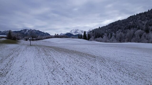 DRONE AERIAL FOOTAGE: The Karwendel mountains, the largest mountain range of the Northern Limestone Alps, near Garmisch-Partenkirchen and Mittenwald, Krun, Bavaria, Germany.