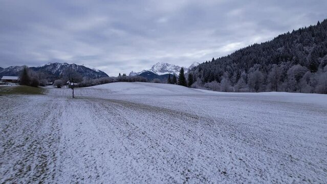 DRONE AERIAL FOOTAGE: The Karwendel mountains, the largest mountain range of the Northern Limestone Alps, near Garmisch-Partenkirchen and Mittenwald, Krun, Bavaria, Germany.