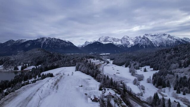 DRONE AERIAL FOOTAGE: The Karwendel mountains, the largest mountain range of the Northern Limestone Alps, near Garmisch-Partenkirchen and Mittenwald, Krun, Bavaria, Germany.