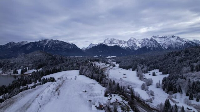 DRONE AERIAL FOOTAGE: The Karwendel mountains, the largest mountain range of the Northern Limestone Alps, near Garmisch-Partenkirchen and Mittenwald, Krun, Bavaria, Germany.