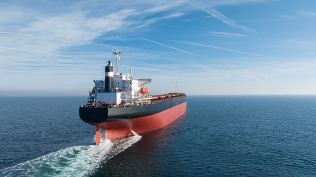 Large cargo ship sailing in open sea