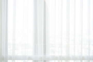 close up of white curtain in the room with sunlight