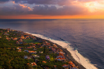 Sunset over Paul Do Mar coastal village in the Madeira Islands, Portugal