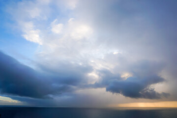 Storm over the Atlantic ocean at sunset