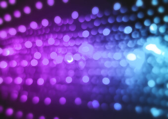 blurred view of abstract bokeh on gradient blue violet background for holiday concept. glowing backdrop. defocused background with blinking light. neon lights background, new retro wave, not in focus.