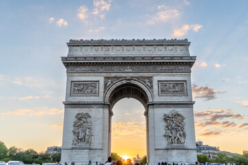 Arch of Triumph taken at a lower angle during sunset in Paris, France