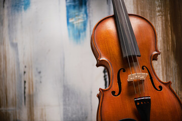 Vintage violin on abstract art colored background. - 558166388
