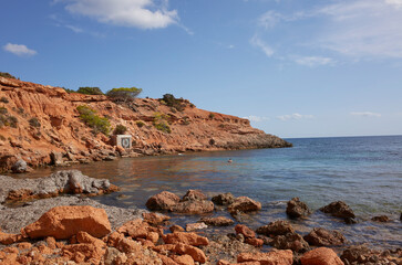 Fototapeta na wymiar Ibiza, Spain - August 27, 2022 : View of Sa Caleta beach