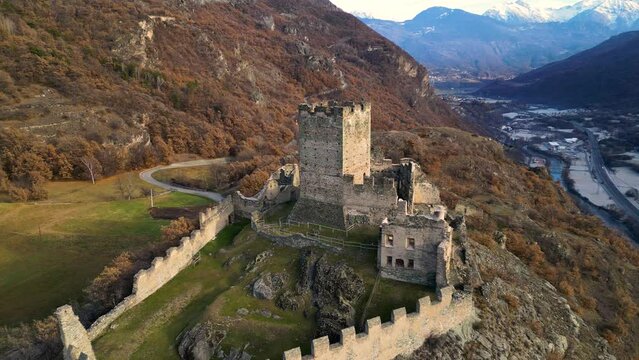 Backward shooting with drone of the castle of Cly Saint Denis Aosta Valley