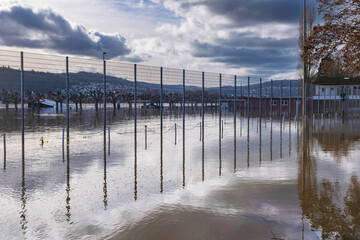 Flooded sports grounds during high water in winter on the Rhine near Rüdesheim/Germany