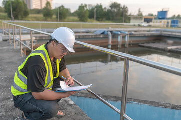 Environmental engineers work at wastewater treatment plants,Water supply engineering working at Water recycling plant for reuse