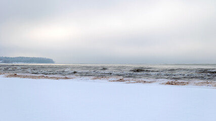 winter landscape, seashore, cloudy, foggy winter afternoon, blurred background