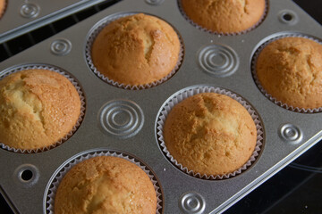 Close-up of a baking tray intended for cooking muffins at home