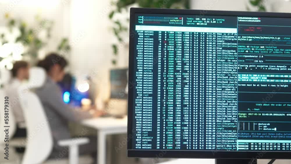 Wall mural computer monitor with binary code large database on table in modern office of international it compa