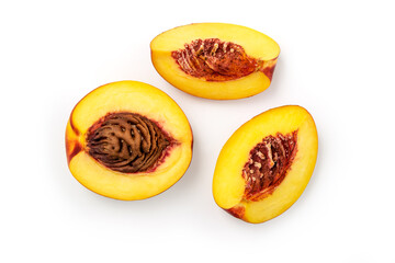 Peach cut in half and quarters isolated on white with clipping path included
