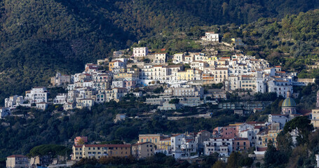 Naklejka premium Touristic City by the Sea. Salerno, Italy. Aerial View. Cityscape and mountains background